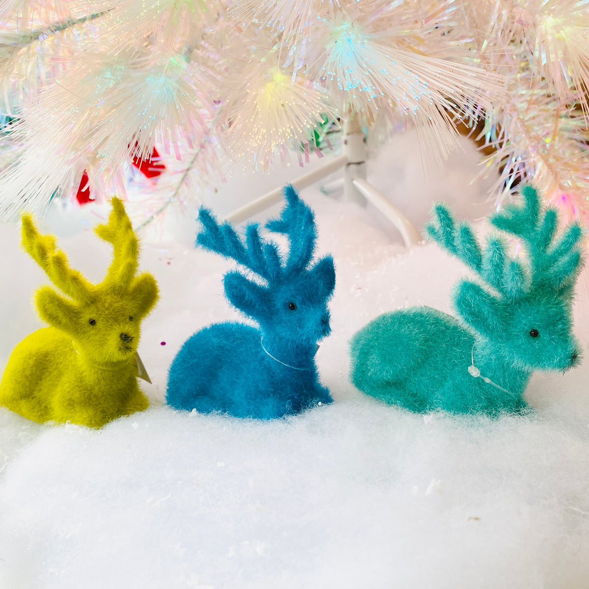 Flocked Deer Laying Assorted 4" (TURQOISE OR LIME)